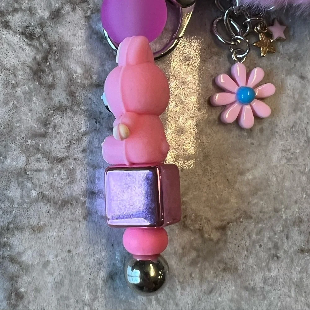 Pink Silicone Labubu Keychain with Pom Pom and Floral Accent - Picture 7 of 8